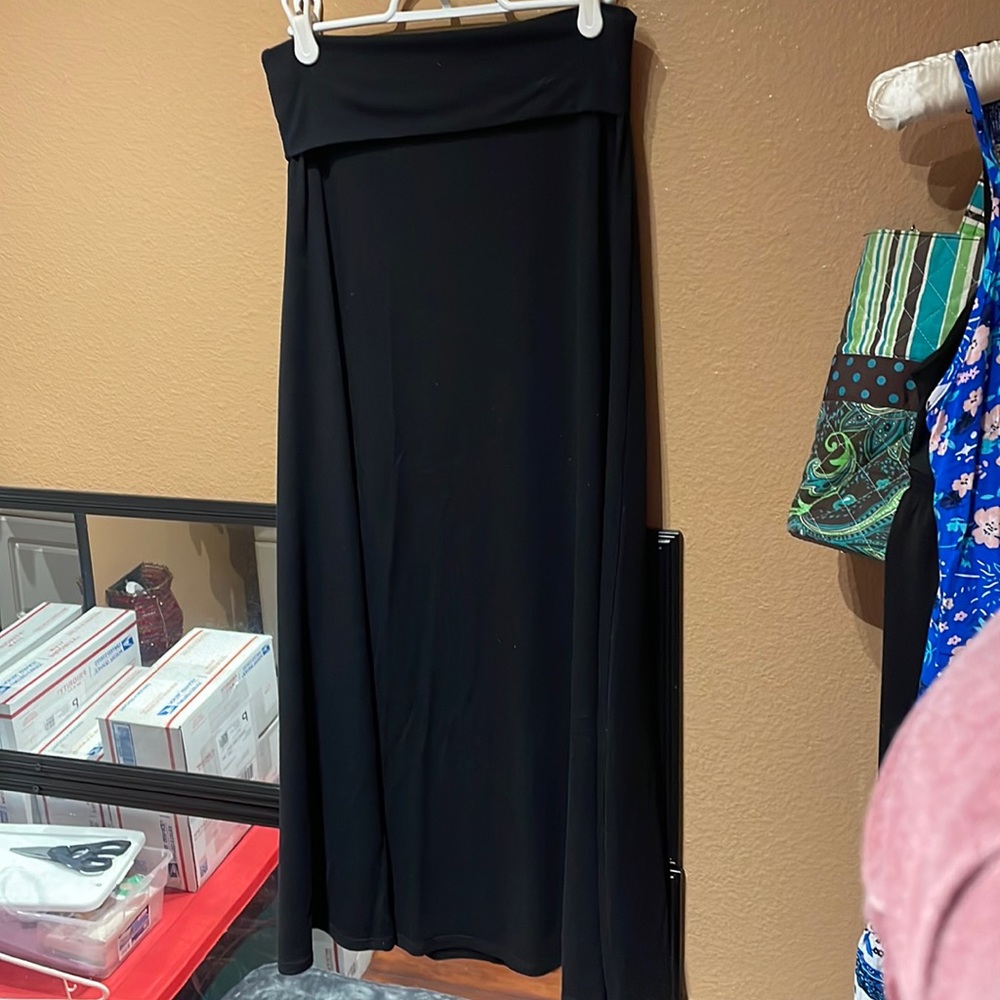 Solid black Maxi skirt. Roll waist.